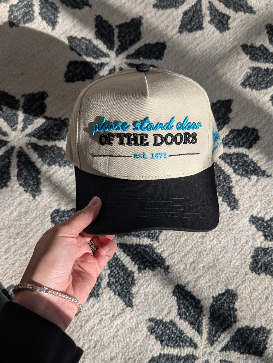 PLEASE STAND CLEAR OF THE DOORS HAT